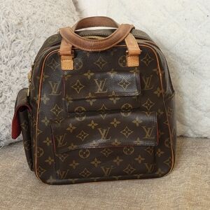 Louis Vuitton Excentri-Cite Handbag Monogram..Authentic.         w/COA